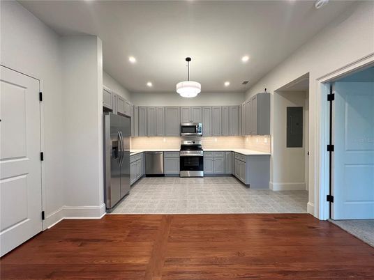Interior, Kitchen, Pendant Lights, Recessed Lighting, Stainless Steel Appliances, Wood Texture Flooring