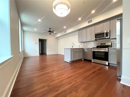 Interior, Kitchen, Recessed Lighting, Stainless Steel Appliances, Wood Texture Flooring