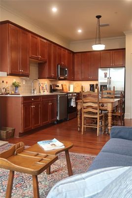 Dining room, Interior, Kitchen, Pendant Lights, Recessed Lighting, Stainless Steel Appliances, Wood Texture Flooring