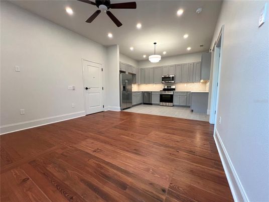 Chandelier, Interior, Kitchen, Recessed Lighting, Stainless Steel Appliances, Wood Texture Flooring