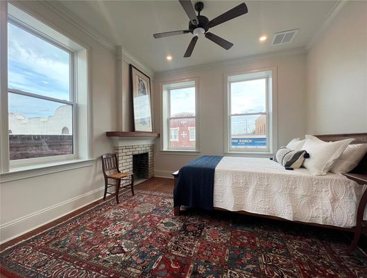 Bedroom, Fireplace, Interior, Recessed Lighting, Wood Texture Flooring