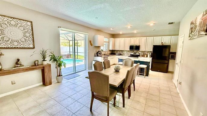 Dining room, Interior, Kitchen, Pool, Recessed Lighting, Stainless Steel Appliances