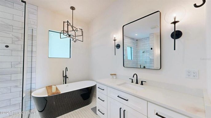 Bathroom, Dual Sink Vanities, Free Standing Baths, Interior, Marble Walls, Pendant Lights, Recessed Lighting