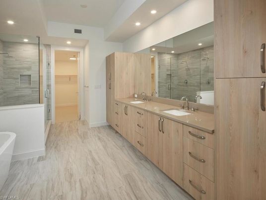 Bathroom, Dual Sink Vanities, Glass Shower, Interior, Marble, Recessed Lighting