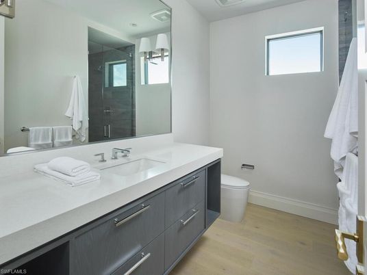 Bathroom, Dual Sink Vanities, Interior, Recessed Lighting, Wood Texture Flooring
