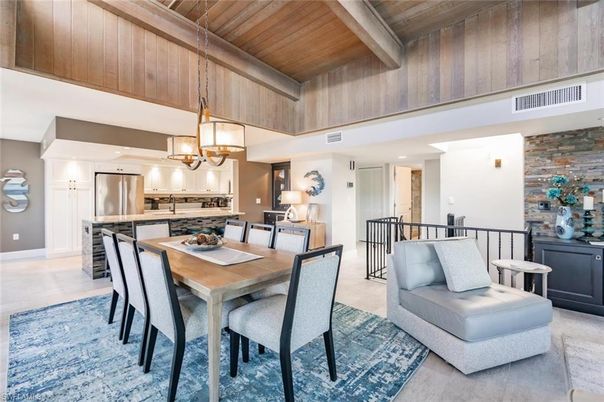 Chandelier, Dining room, Interior, Kitchen, Pendant Lights, Recessed Lighting, Stainless Steel Appliances, Stone Walls, Wooden Beams, Wooden Ceilings