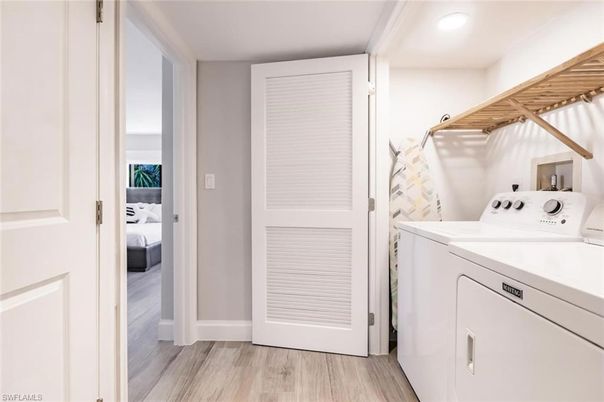 Bedroom, Interior, Recessed Lighting, Utility Closets, Washer, Wood Texture Flooring