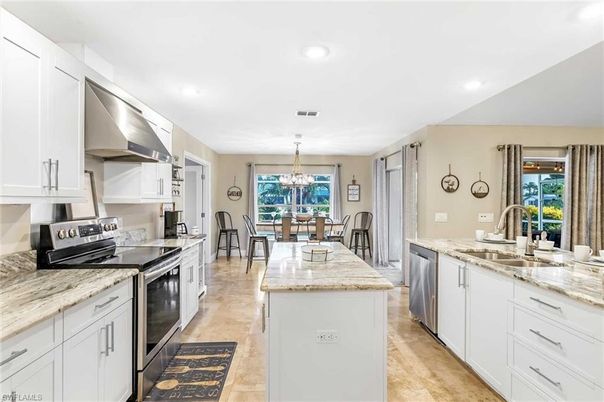 Chandelier, Dining room, Interior, Kitchen, Recessed Lighting, Stainless Steel Appliances