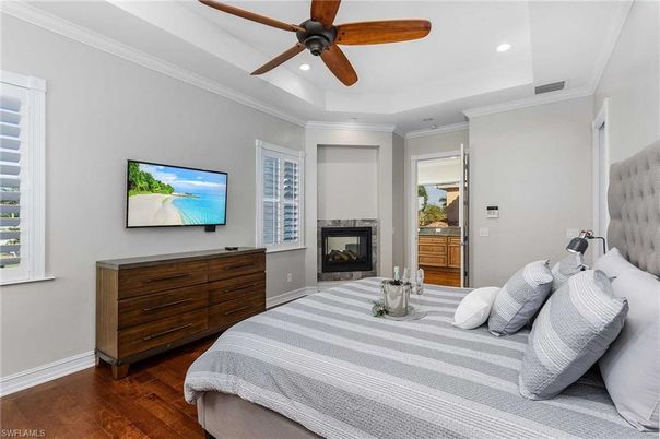 Bedroom, Fireplace, Interior, Recessed Lighting, Wood Texture Flooring