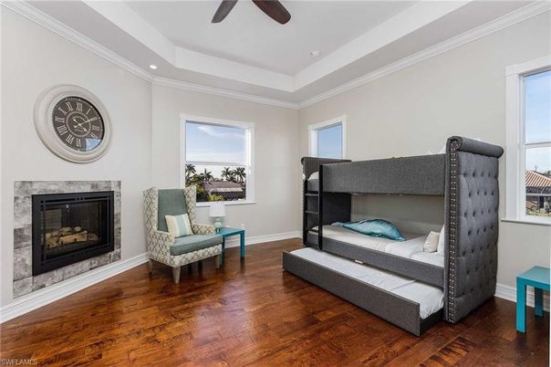 Bedroom, Fireplace, Interior, Recessed Lighting, Wood Texture Flooring