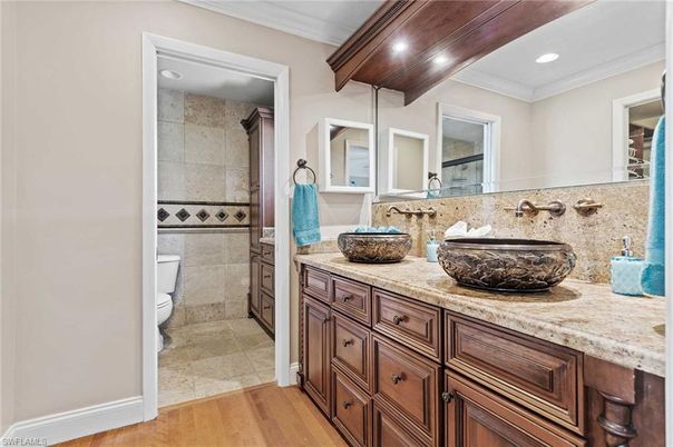 Bathroom, Dual Sink Vanities, Interior, Recessed Lighting, Wood Texture Flooring