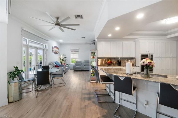 Dining room, Interior, Kitchen, Living room, Recessed Lighting, Wood Texture Flooring