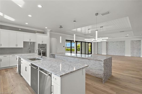 Interior, Kitchen, Pendant Lights, Recessed Lighting, Stainless Steel Appliances, Wood Texture Flooring