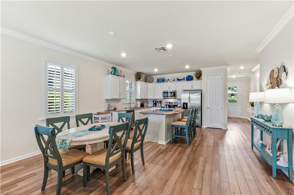 Dining room, Interior, Kitchen, Recessed Lighting, Stainless Steel Appliances, Wood Texture Flooring