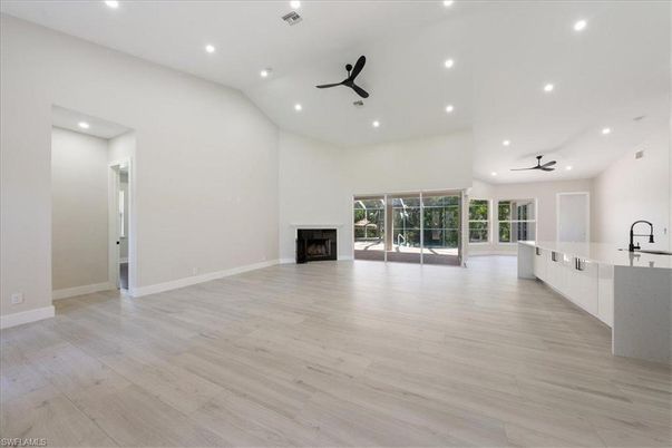 Empty room, Fireplace, Interior, Recessed Lighting, Wood Texture Flooring