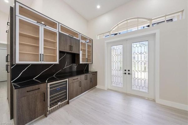 Interior, Kitchen, Marble Walls, Recessed Lighting, Wood Texture Flooring