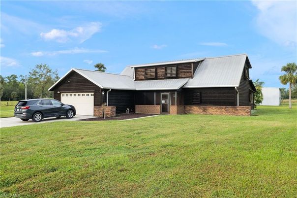 Attached, Backyard, Exterior, Facade, Brick Facade, Log Home