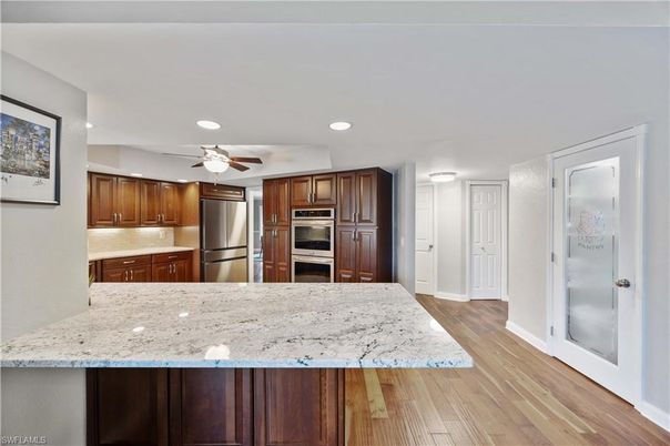 Interior, Kitchen, Recessed Lighting, Stainless Steel Appliances, Wood Texture Flooring