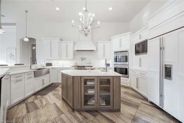 Chandelier, Interior, Kitchen, Pendant Lights, Recessed Lighting, Stainless Steel Appliances, Wood Texture Flooring
