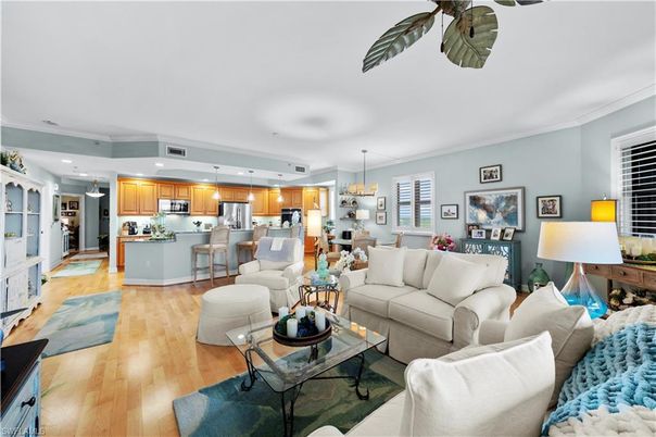 Chandelier, Dining room, Interior, Kitchen, Living room, Pendant Lights, Recessed Lighting, Stainless Steel Appliances, Wood Texture Flooring