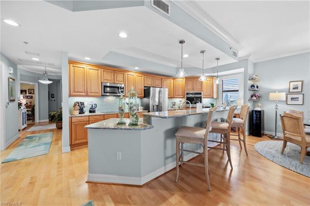Dining room, Interior, Kitchen, Pendant Lights, Recessed Lighting, Stainless Steel Appliances, Wood Texture Flooring