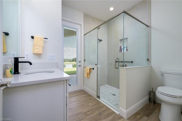 Bathroom, Glass Shower, Interior, Recessed Lighting, Wood Texture Flooring