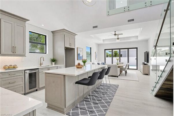 Dining room, Interior, Kitchen, Recessed Lighting, Stainless Steel Appliances, Wood Texture Flooring