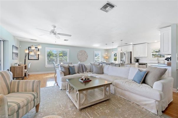 Dining room, Interior, Kitchen, Living room, Pendant Lights, Stainless Steel Appliances, Wood Texture Flooring
