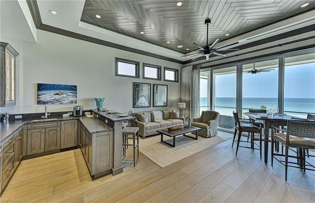 Dining room, Interior, Living room, Recessed Lighting, Water, Wooden Ceilings, Wood Texture Flooring