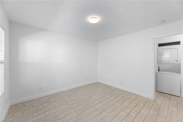 Empty room, Interior, Utility Closets, Washer, Wood Texture Flooring