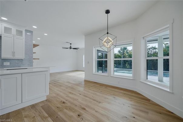 Empty room, Interior, Kitchen, Pendant Lights, Recessed Lighting, Wood Texture Flooring