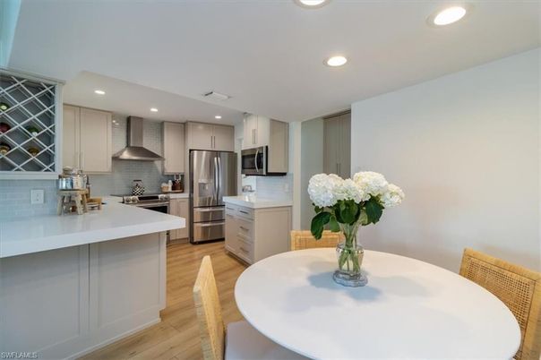 Dining room, Interior, Kitchen, Recessed Lighting, Stainless Steel Appliances, Wood Texture Flooring