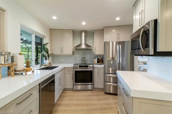 Interior, Kitchen, Recessed Lighting, Stainless Steel Appliances, Wood Texture Flooring