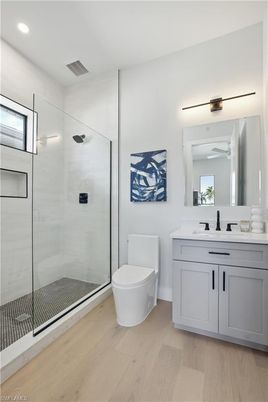 Bathroom, Glass Shower, Interior, Recessed Lighting, Wood Texture Flooring