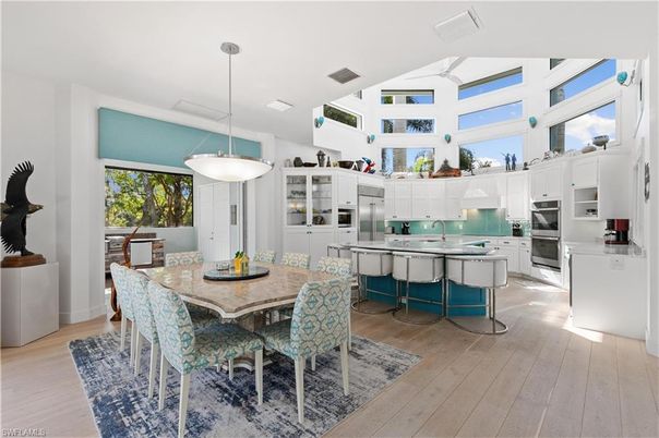 Dining room, Interior, Kitchen, Pendant Lights, Stainless Steel Appliances, Wood Texture Flooring