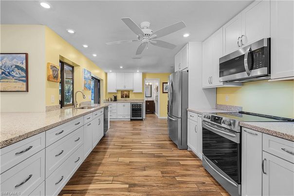 Interior, Kitchen, Recessed Lighting, Stainless Steel Appliances, Wood Texture Flooring
