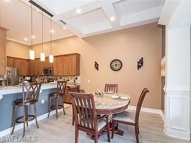 Dining room, Interior, Kitchen, Pendant Lights, Recessed Lighting, Stainless Steel Appliances, Wood Texture Flooring