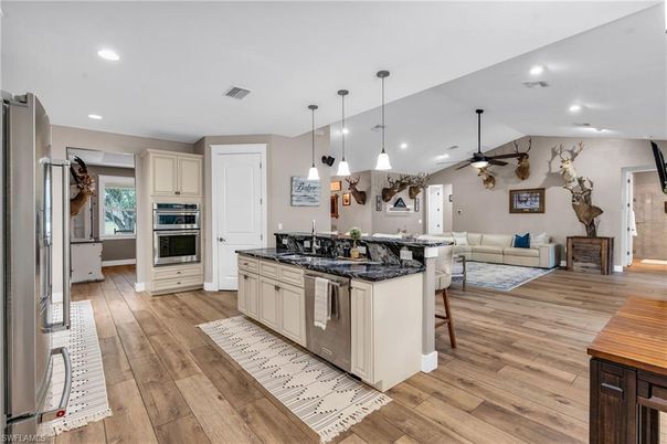 Interior, Kitchen, Living room, Pendant Lights, Recessed Lighting, Stainless Steel Appliances, Wood Texture Flooring