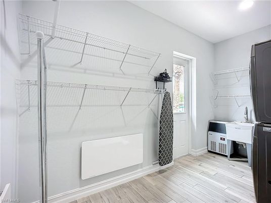 Interior, Recessed Lighting, Utility Closets, Washer, Wood Texture Flooring