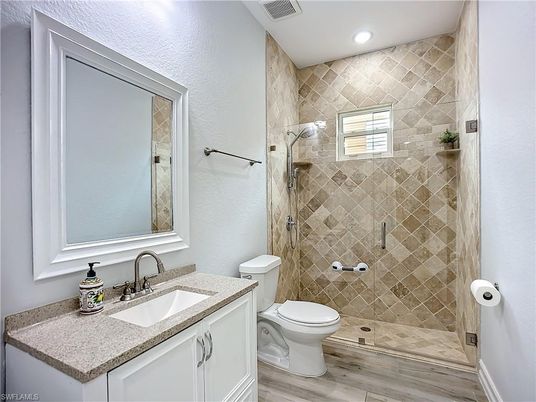 Bathroom, Glass Shower, Interior, Recessed Lighting, Wood Texture Flooring
