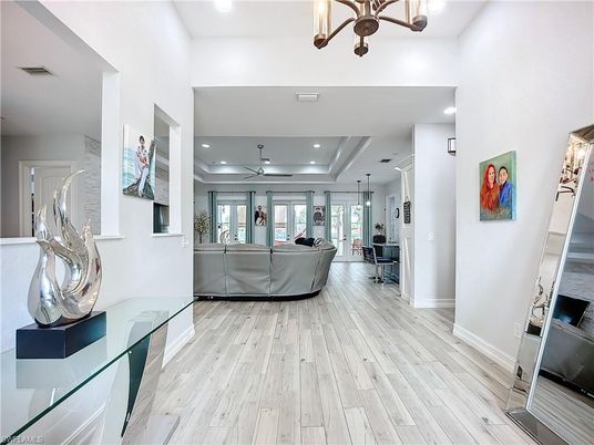 Interior, Living room, Pendant Lights, Recessed Lighting, Wood Texture Flooring