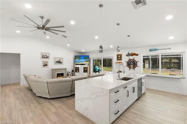 Fireplace, Interior, Kitchen, Living room, Pendant Lights, Recessed Lighting, Wood Texture Flooring