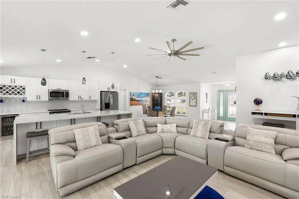 Dining room, Interior, Kitchen, Living room, Pendant Lights, Recessed Lighting, Stainless Steel Appliances, Wood Texture Flooring