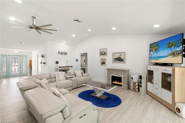 Fireplace, Interior, Living room, Recessed Lighting, Wood Texture Flooring