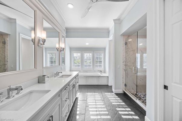 Bathroom, Dual Sink Vanities, Glass Shower, Interior, Marble Walls, Recessed Lighting