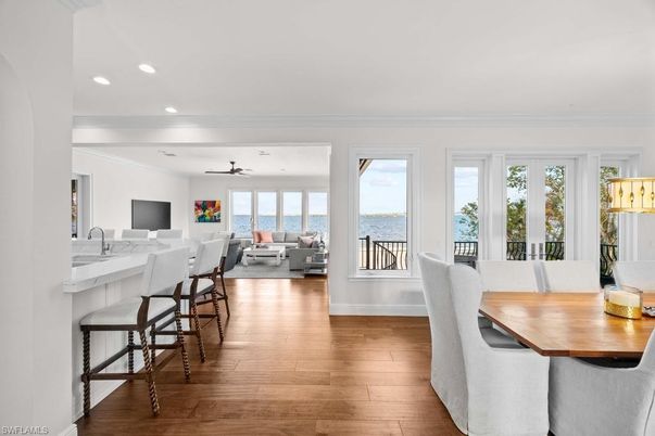 Dining room, Interior, Living room, Recessed Lighting, Water, Wood Texture Flooring