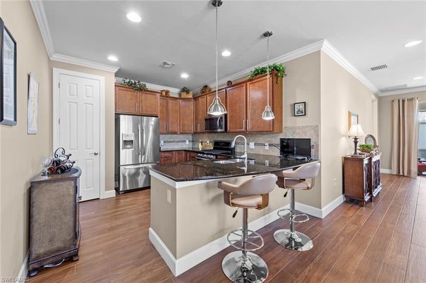 Interior, Kitchen, Pendant Lights, Recessed Lighting, Stainless Steel Appliances, Wood Texture Flooring