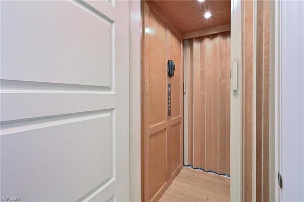 Elevator, Interior, Recessed Lighting, Wooden Ceilings, Wood Texture Flooring, Wooden Walls