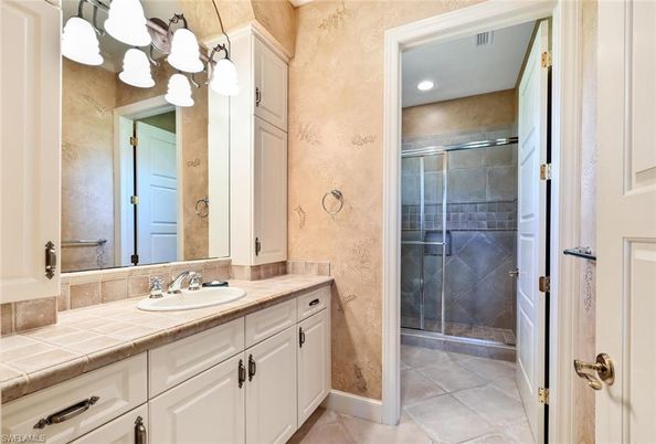 Bathroom, Glass Shower, Interior, Recessed Lighting, Tile Countertops