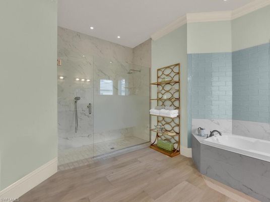 Bathroom, Glass Shower, Interior, Marble Walls, Recessed Lighting, Wood Texture Flooring
